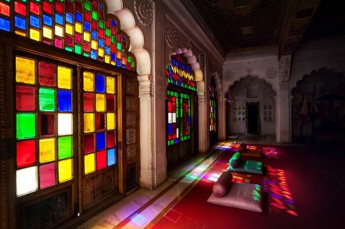 Colorful mosaic windows and doors in the emperor hall of Mehrangarh Fort