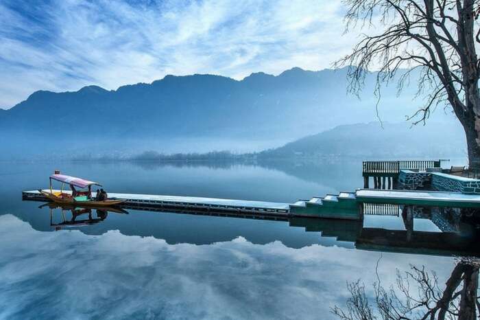 Picture perfect view of Dal Lake covered with fog