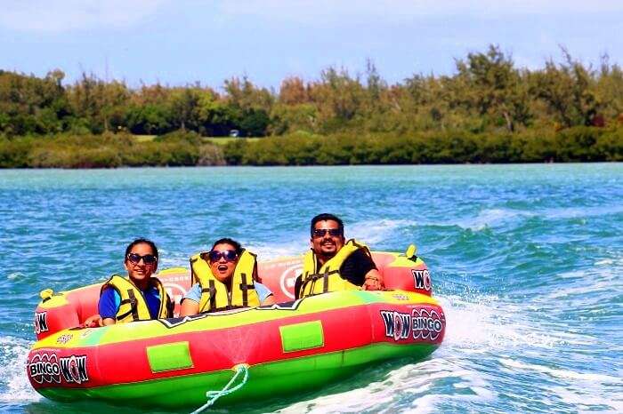 Sandeep and his friends doing the boat ride at Ile aux Cerfs island