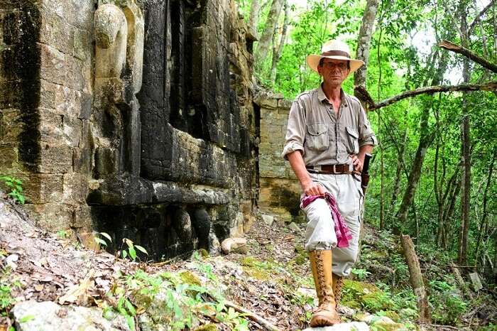 An archaeologist at the excavation site of the Maya city of Lagunita