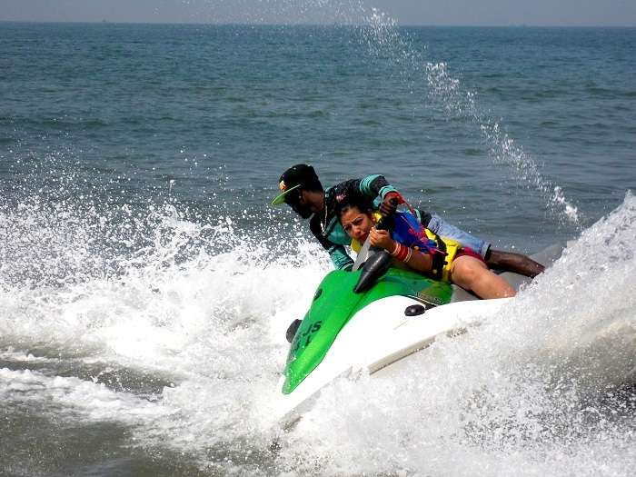 Couple doing water sports in Goa