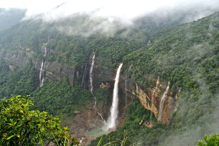 a beautiful waterfall in mountains