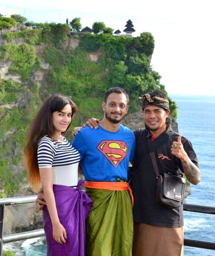 Sanchit and his wife click a picture with the local of Bali