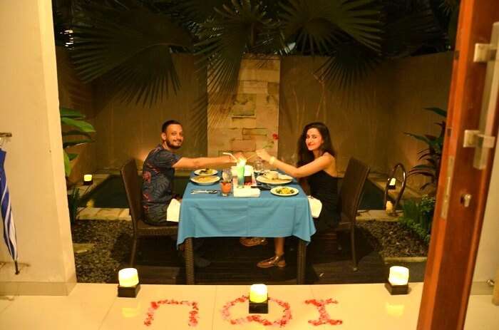 Sanchit and his wife enjoying Candle light dinner in Bali