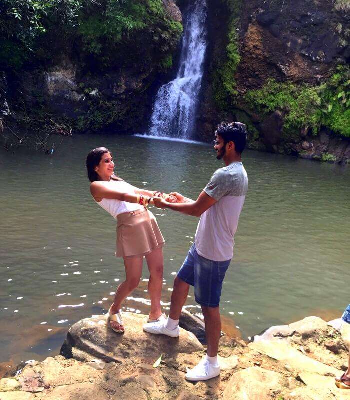 Malay and his wife at the waterfall