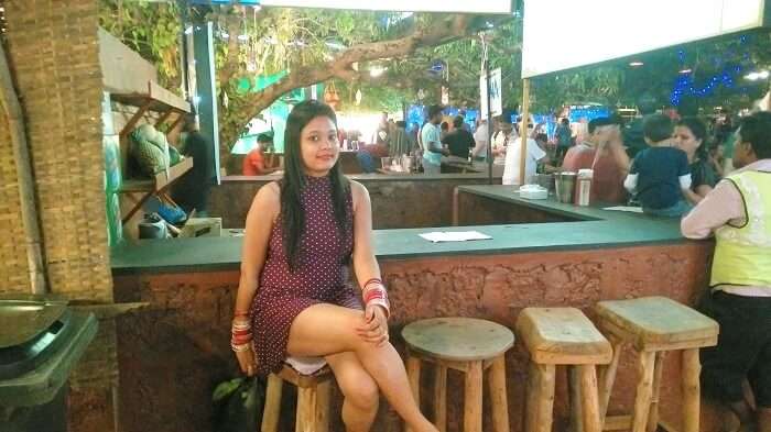 Female tourist in Goa restaurant