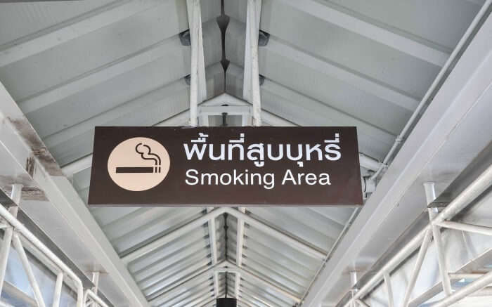 Board with no smoking sign in Thailand