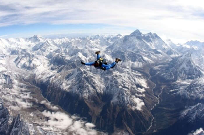 Skydiver enjoying the freefall over Lake Wanaka in New Zealand