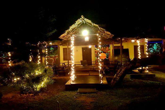 Avocado Garden Restaurant main gate illuminated by light 