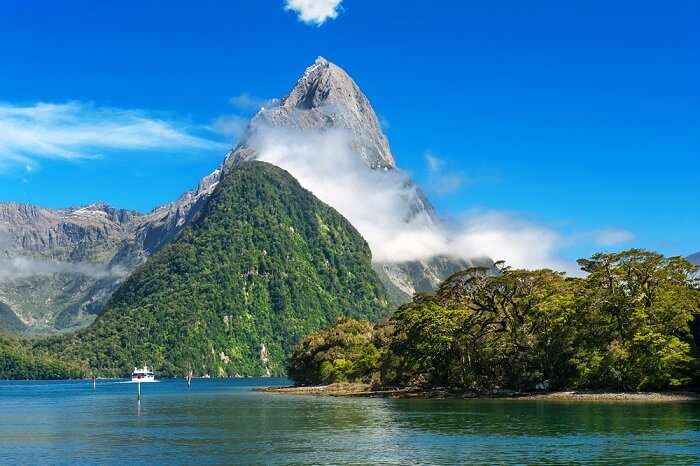 Mitre Peak rising by Milford Sound Fiord