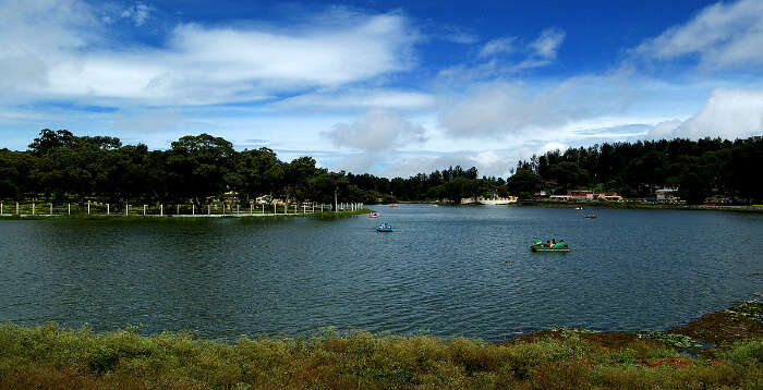 Gorgeous Yercaud lake with boats sailing