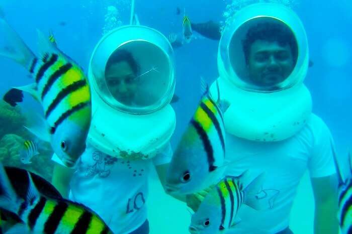 Underwater seawalking couple in Andaman