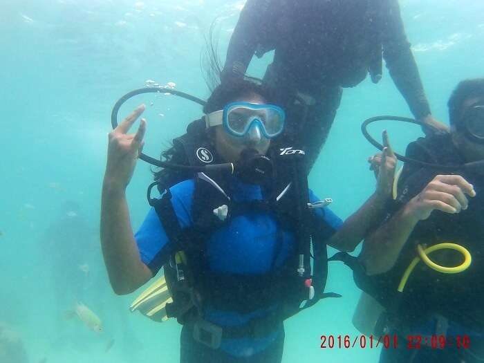 couple scuba diving in andaman