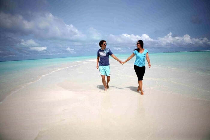 Couple at fulhadhoo beach maldives