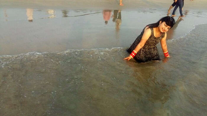 enjoying at beach kerala
