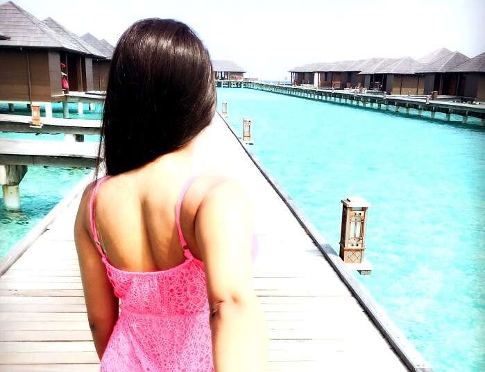 Girl enjoying Sea therapy in maldives