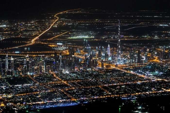 Top view of Dubai city from a helicopter at night