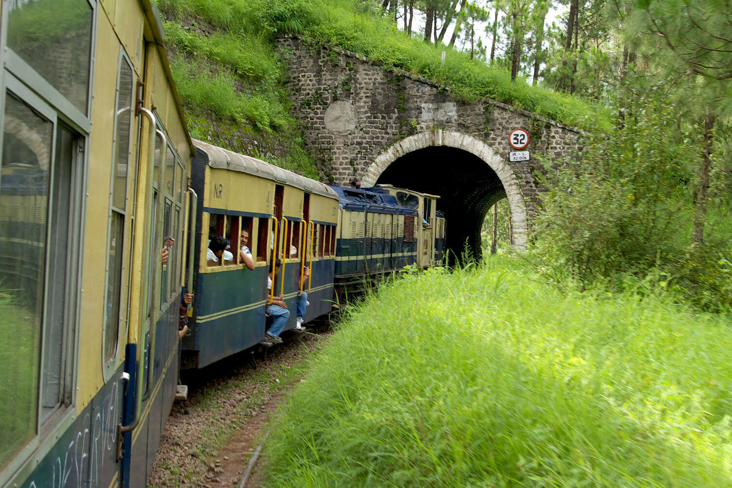 toy train coming out of a tunnel