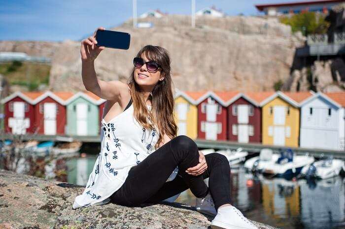a girl clicking selfie in Sweden