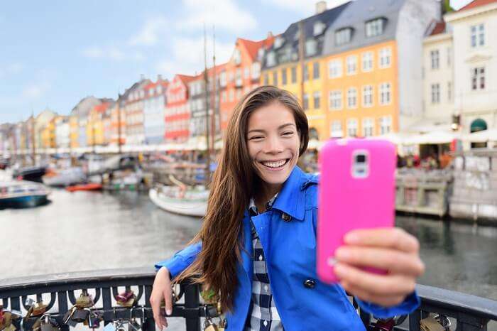 A girl clicking selfie in Denmark