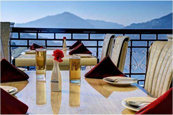 Two beer glasses on table at a Roof top cafe in mountains