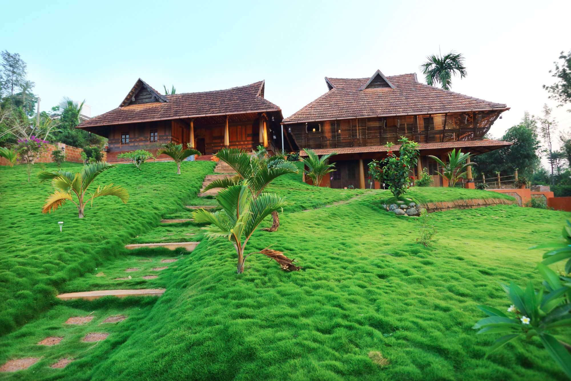 Luxury suites of Thejas Resort surrounded by lush greenery