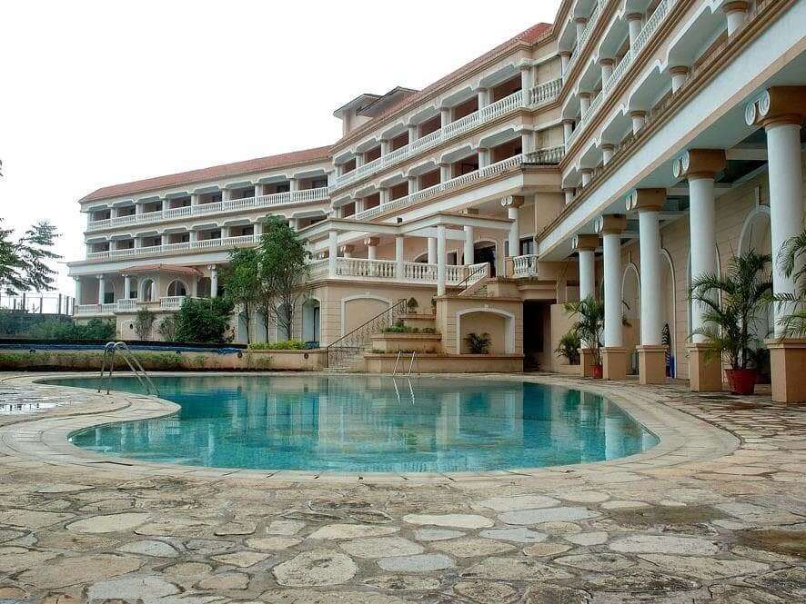 an outdoor pool of a resort in Lonavla