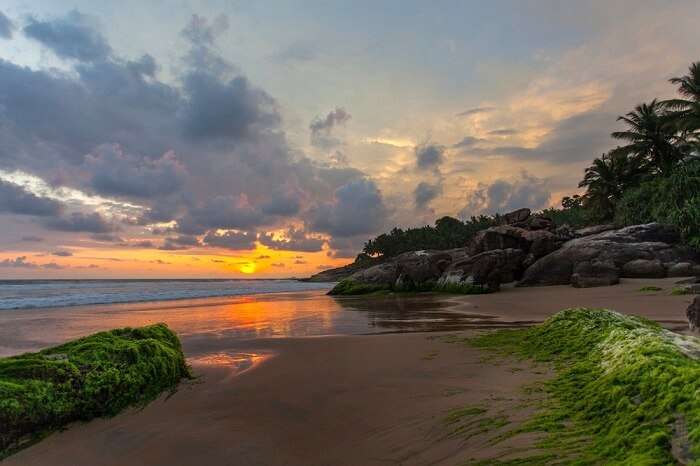 witness an amazing sunset in the beach