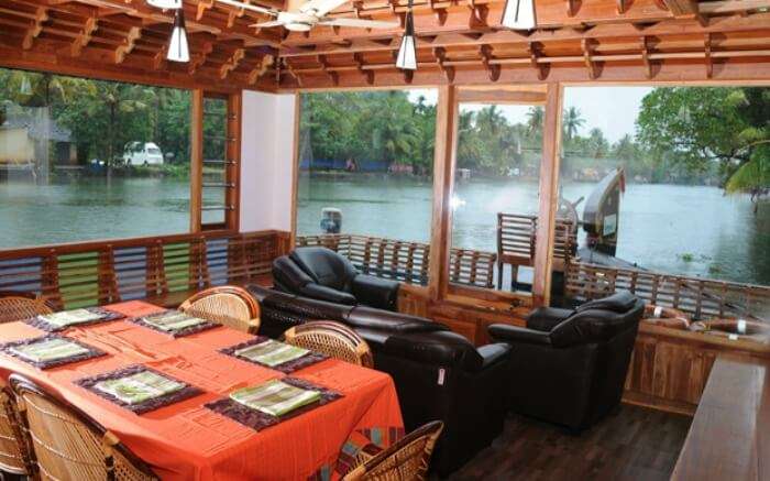 Dining space of Kumarakom Houseboat Holidays in Kumarakomss