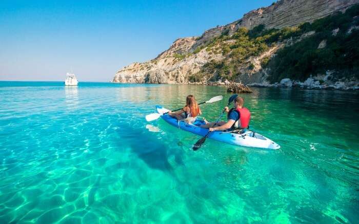 A couple kayaking in Thailand