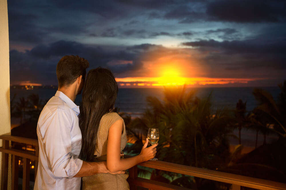 A couple looking at sunset in Bali 