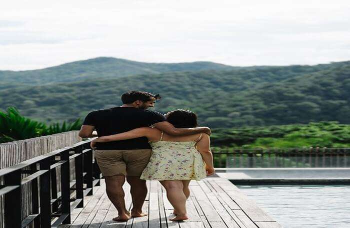 Couple holding each other hands