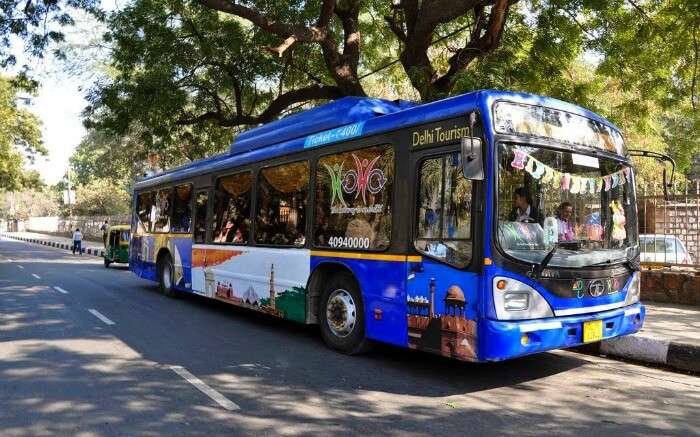 blue colour hoho bus on Delhi roadsSS13042017