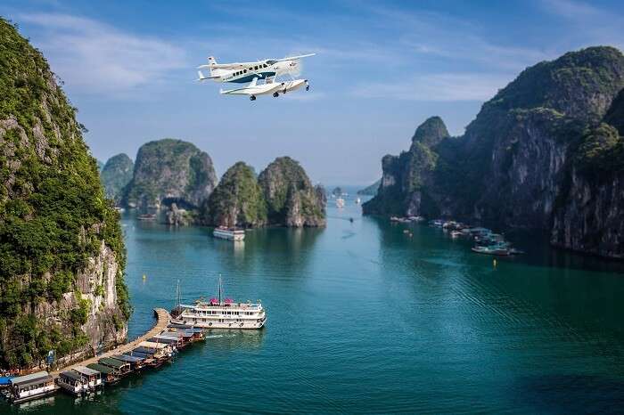 A seaplane flying over the Halong Bay near Hanoi