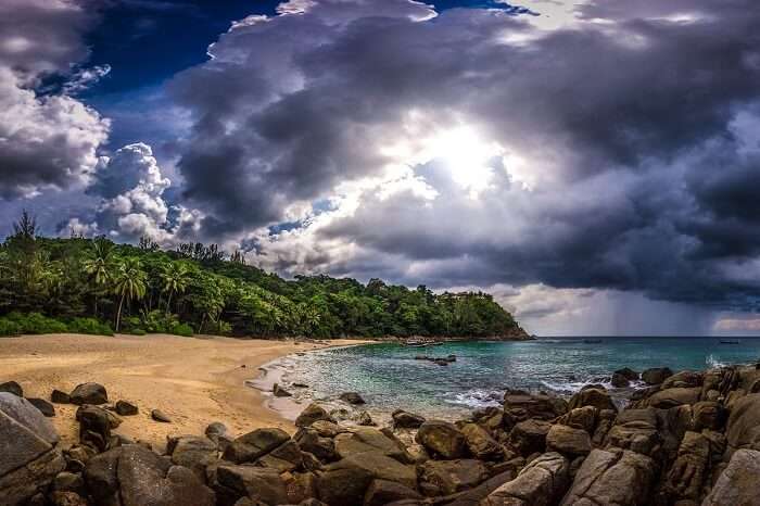 A beautiful shot of the cloud-covered sky over the Banana Rock Beach in Phuket
