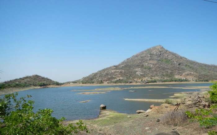 lake encircled by valleys in Jessore Sloth Bear Sanctuary