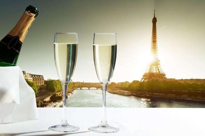 wine in front of eiffel tower paris