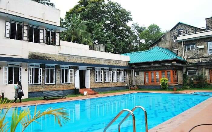 outdoor pool at hotel Aranya Nivas in Thekkady