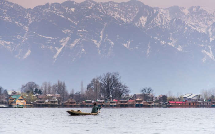 A boat crossing Nigeen lake in Srinagar in Kashmir 
