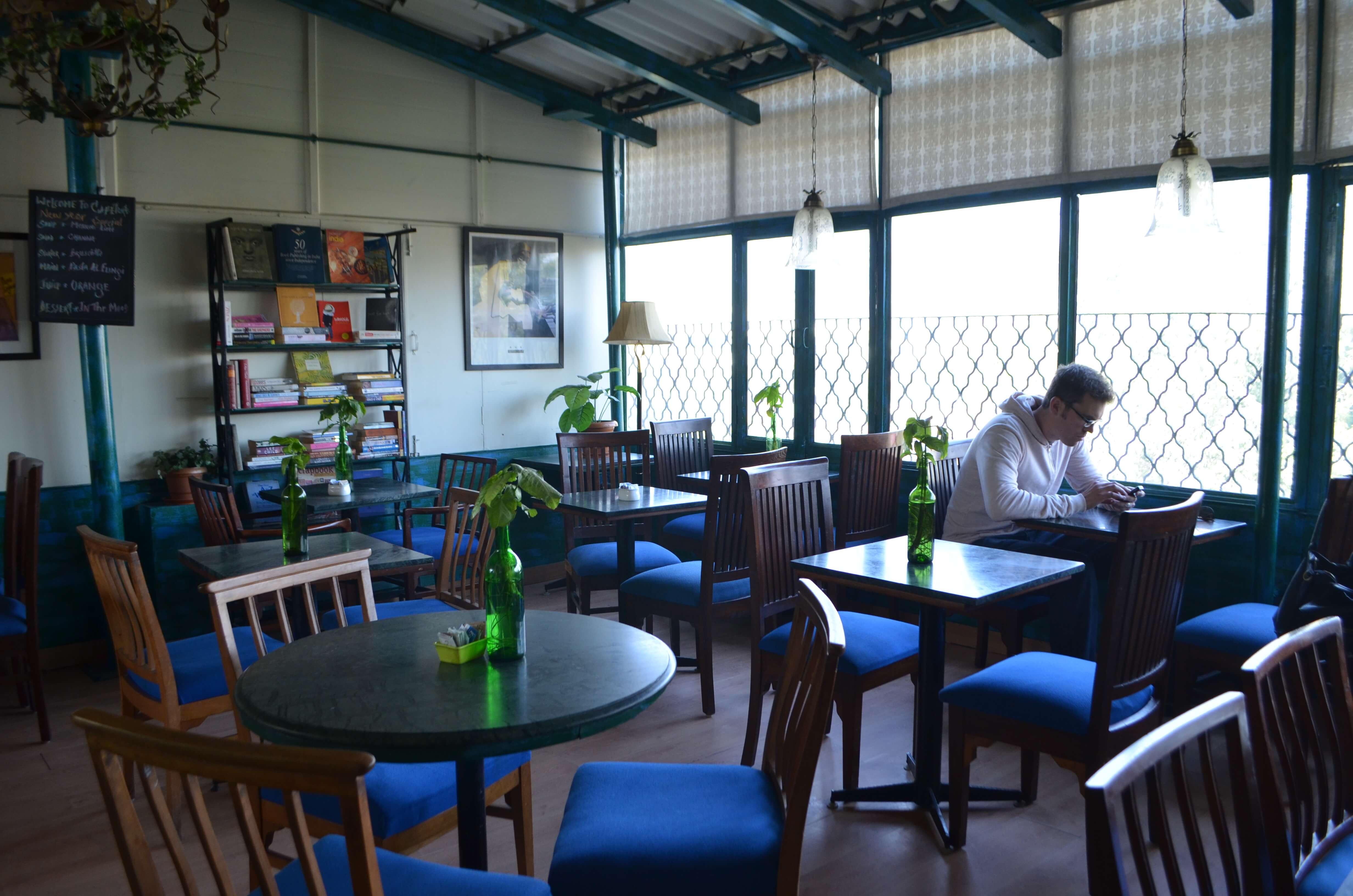 a man sitting in a cafe