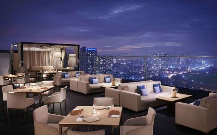 Rooftop seating area of Asilo facing Arabian Sea in Mumbai