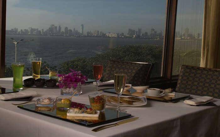 Well laid dining table at Ziya - The Oberoi facing sea in Mumbai