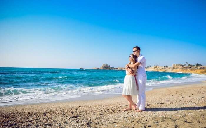 a couple on Gordon Beach