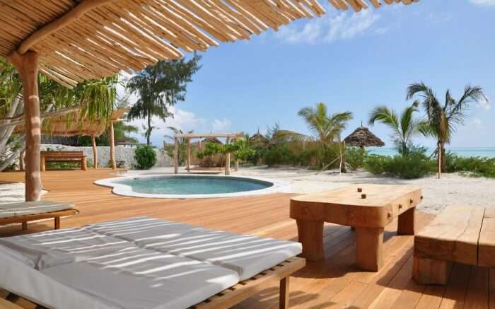 a private pool in a beachfront villa 