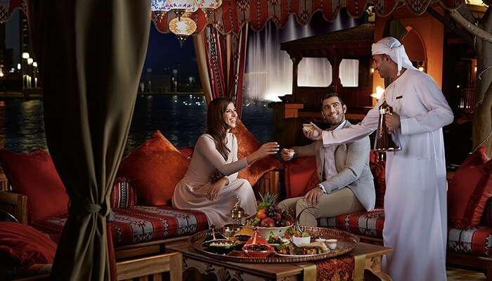 Guests being served at a lakeside Ramadan tent at The Palace Downtown Dubai