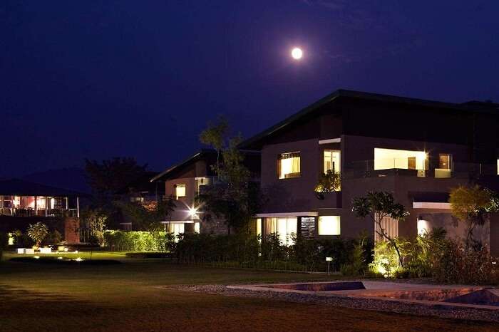A snap of the luxe cottages of Aalia On The Ganges resort at night