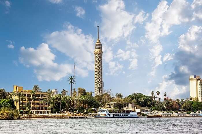 A cruise on the Nile River passing by the Cairo tower in Egypt