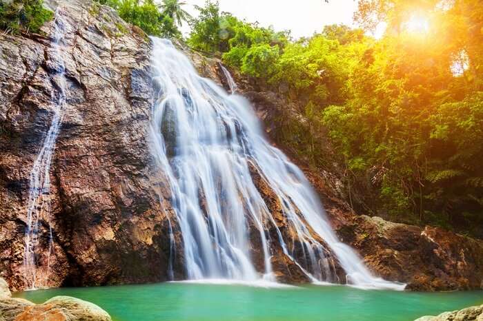 A sunset shot of the Na Muang waterfall in Koh Samui