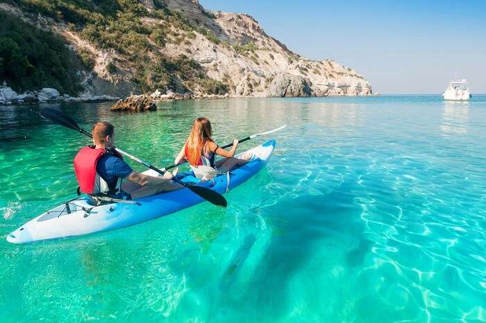 A couple takes a sea kayaking tour from Koh Samui