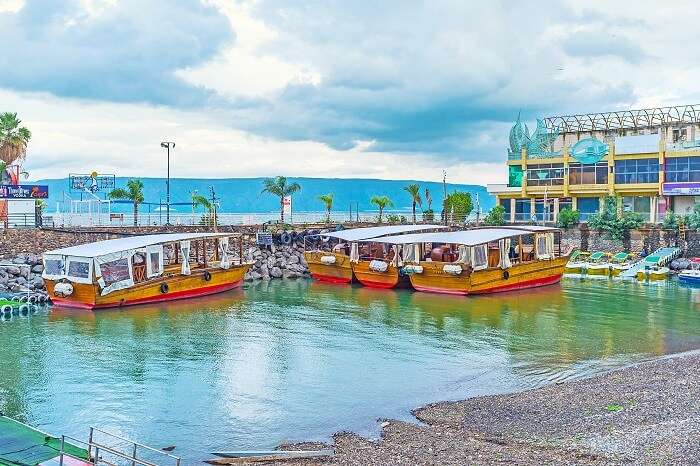 The wooden pleasure boats in harbor on the Kinneret Lake of Tiberias in Israel